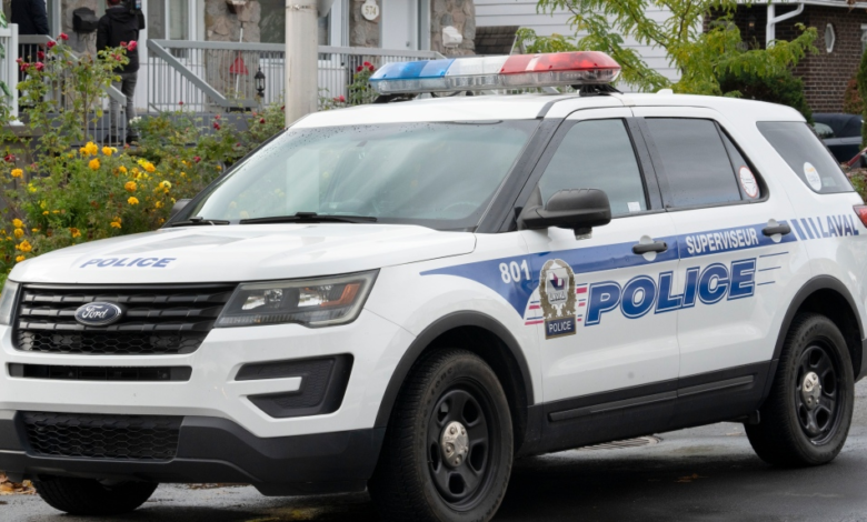 سيارة شرطة أمام منزل الرجل الذي قتل طفليه شمال مونتريال
