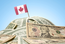 الدولار الكندي يسجل أكبر انخفاض له منذ عام تقريبا مقابل نظيره الأمريكي